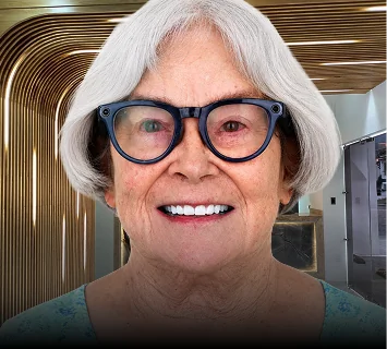 Older woman with glasses showing her finished all-on-x treatment.