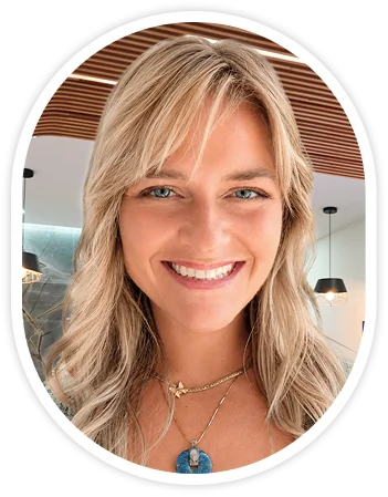 Smiling woman portrait highlighting ultra-thin veneers final result.